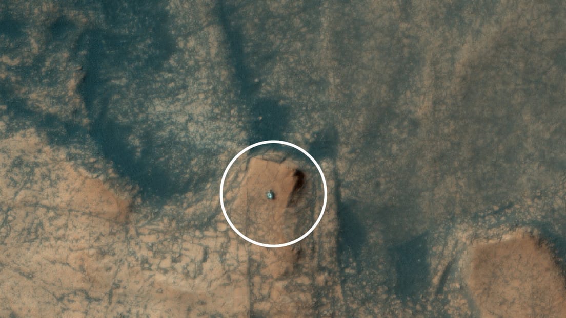 NASA's Curiosity probe was captured from space as it climbed up rock formations on the surface of Mars