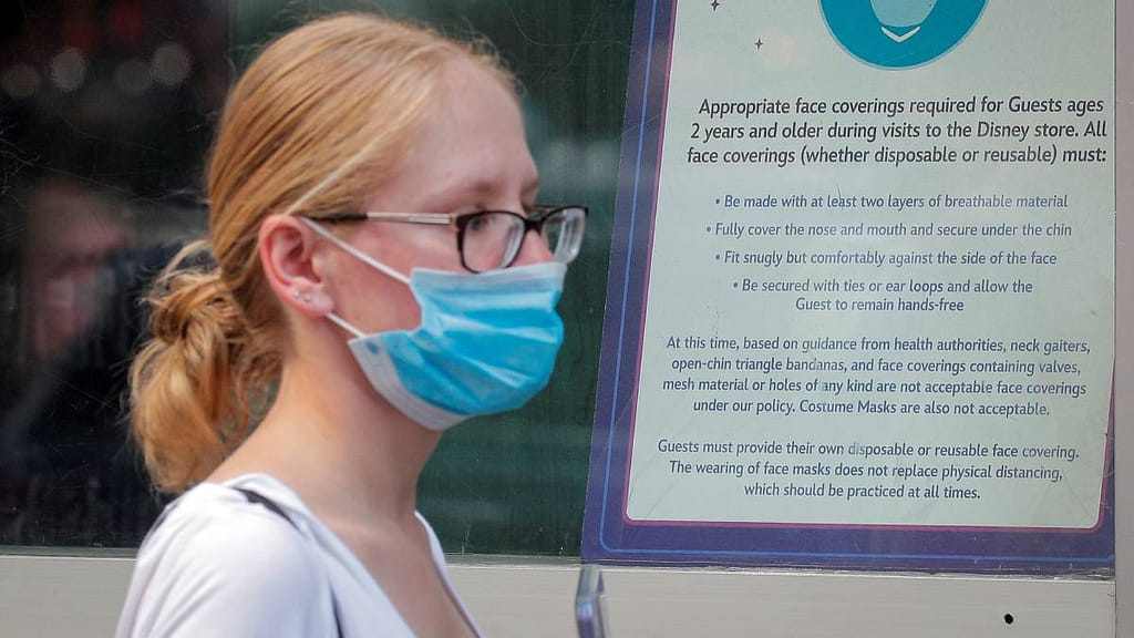 US asks COVID-19 vaccinators to continue wearing face masks