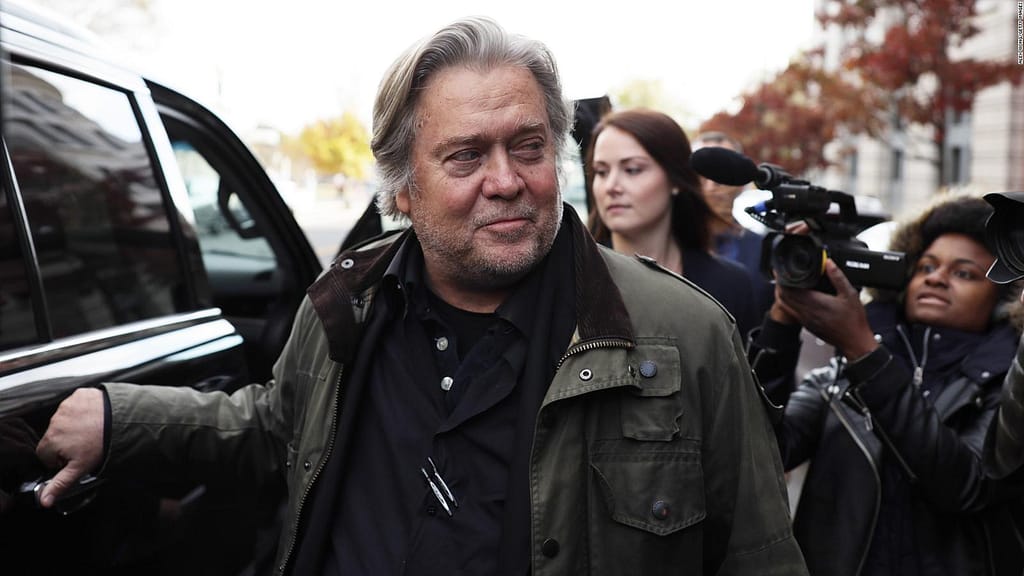 Bannon surrenders to the FBI after being charged with criminal contempt