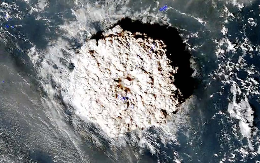 Satellite images taken before and after the eruption of the Tonga volcano