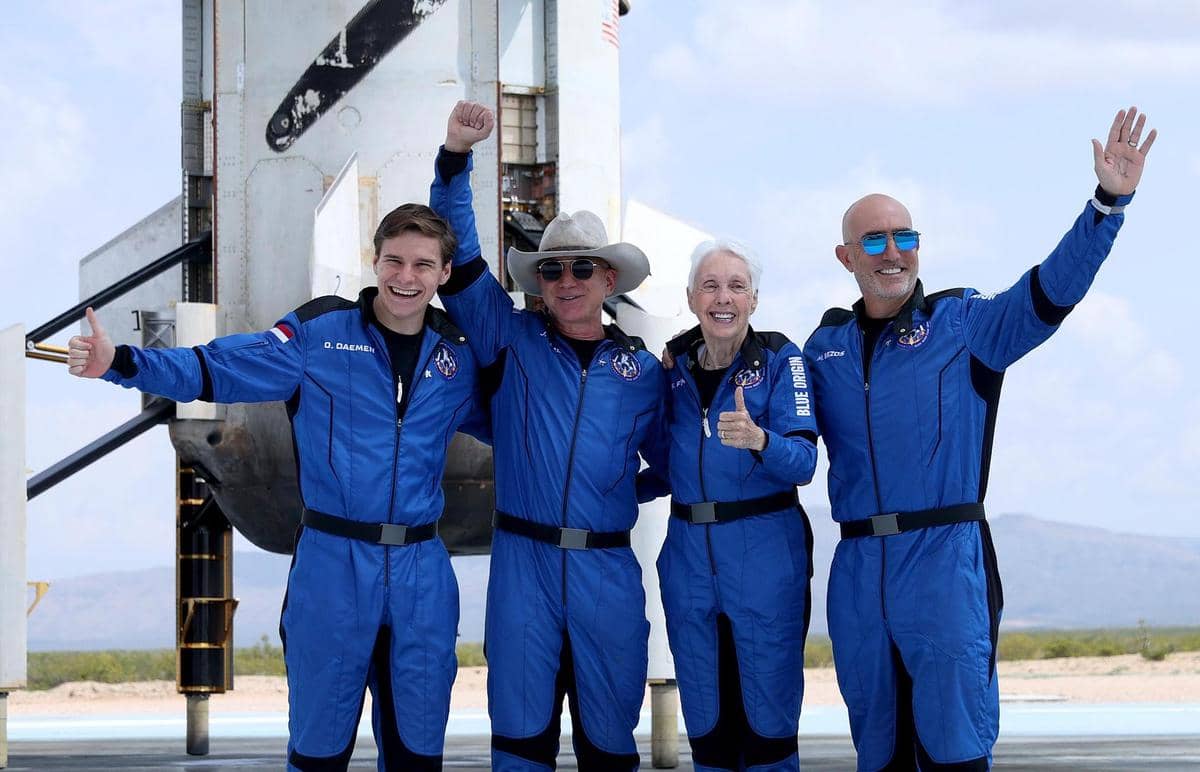 Oliver Damon, Jeff Bezos, Wally Funk and Mark Bezos (left to right) after they fly into space with a Blue Origin New Shepherd rocket on July 20, 2021 in Van Horn, Texas.