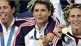 Julie Fode, Mia Hamm, and Lily after the United States won gold in the Athens Olympics