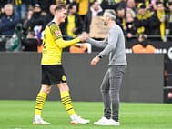 Marco Rose applauds Steffen Tigges during the Bundesliga match between Borussia Dortmund and 1. FC Cologne.
