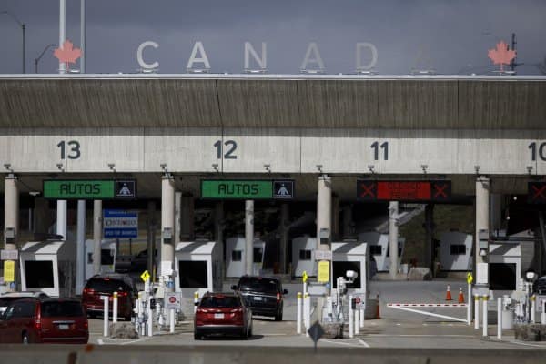 The Canadian government begins work to reopen the border with the United States