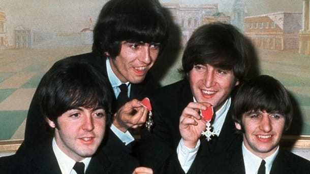 Three Parts: The Beatles Documentary "Lord of the rings"-Exit soon.  the four "mushroom caps" British pop group "the Beatles"(lr): Paul McCartney, George Harrison, John Lennon and Ringo Starr with medals "Member of the Order of the British Empire".