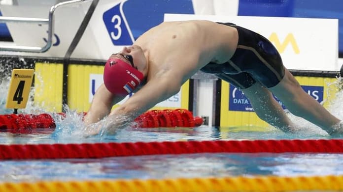 Kolesnikow swims world record - Vogelmann 