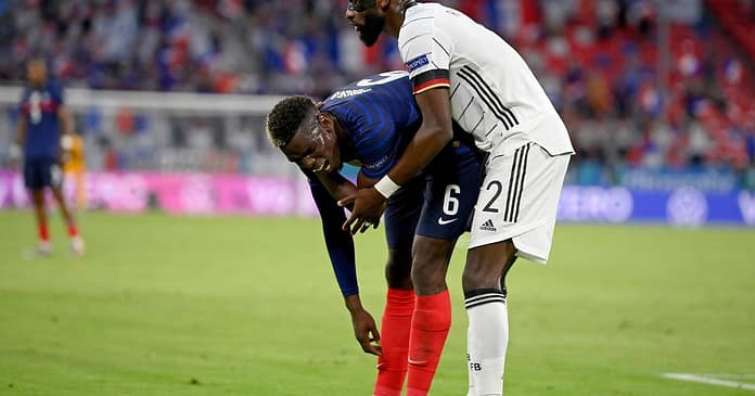 Antonio Rudiger bites Paul Pogba during the match between Germany and France

