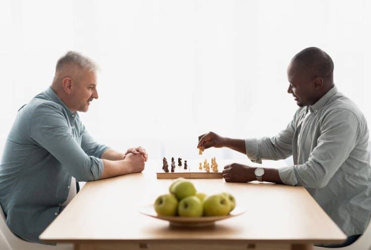 Two men playing chess during the epidemic