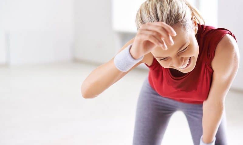 Women sweat while exercising