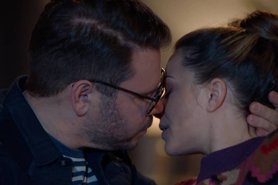 Tuner (left) is overwhelmed by his old feelings for Emily and tries to kiss her.