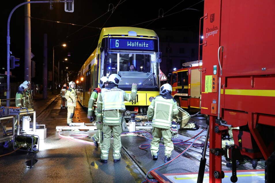 Firefighters are trying to bring back one of the two trams that derailed Monday evening.