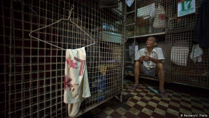 Today an estimated 200,000 people live in a cage or occupy a bed in a shared apartment.