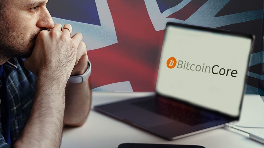 Pantalla con logo de Bitcoin Core, bandera de Reino Unido y hombre preocupado.