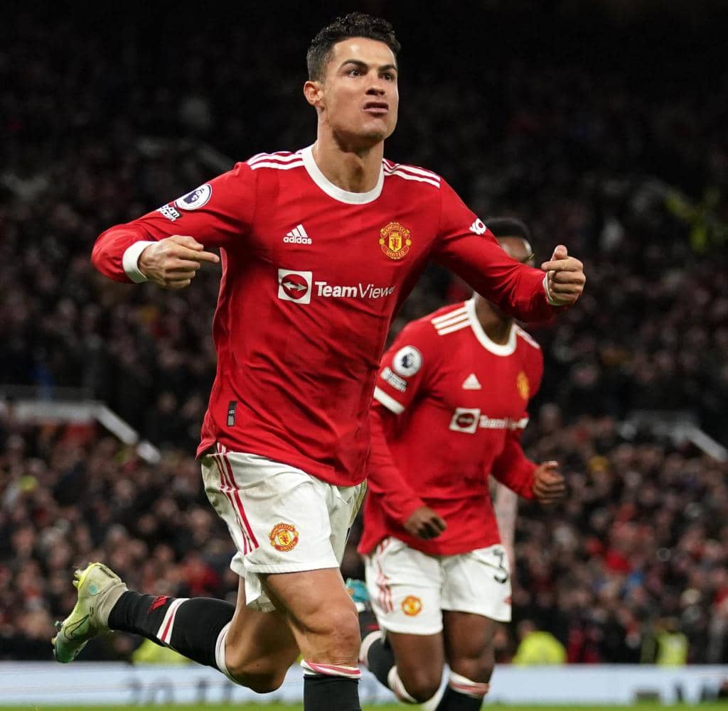 12.03.2022, Großbritannien, Manchester: Manchester United's Cristiano Ronaldo celebrated his hat-trick and his team's third goal during a Premier League match at Old Trafford.  Image Date: Saturday March 12, 2022. Photo: Martin Rickett / PA Wire / DPA