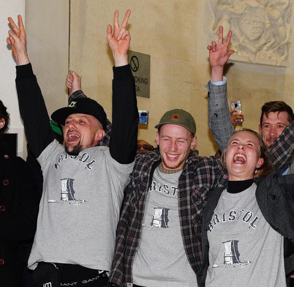 Sage Willoughby, Jake Scouse, Milo Bunsford and Ryan Graham (left) celebrate in court after their acquittal
