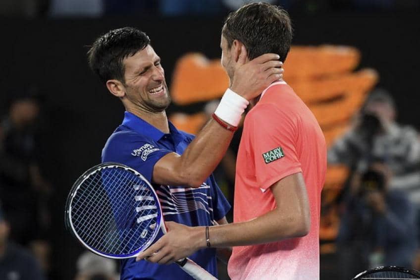 Novak Djokovic congratulates Daniil Medvedev on reaching number one in the world rankings