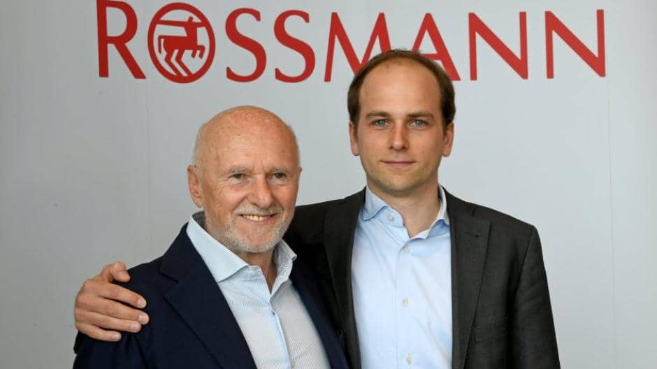 Dirk and Raoul Rossmann at a press conference.